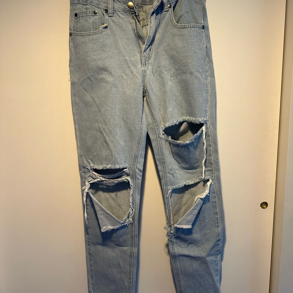 Distressed Light Blue Jeans